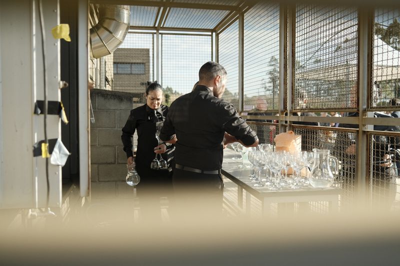 Chuys catering team setting up food for a corporate event